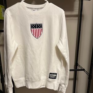 Nike White Crewneck Sweater with Shield Design